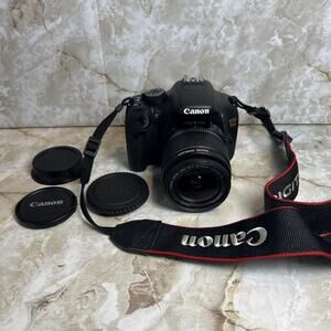 Canon EOS Rebel T2i DSLR Camera with EF-S 18-55mm f / 3.5-5.6 Battery + Charger